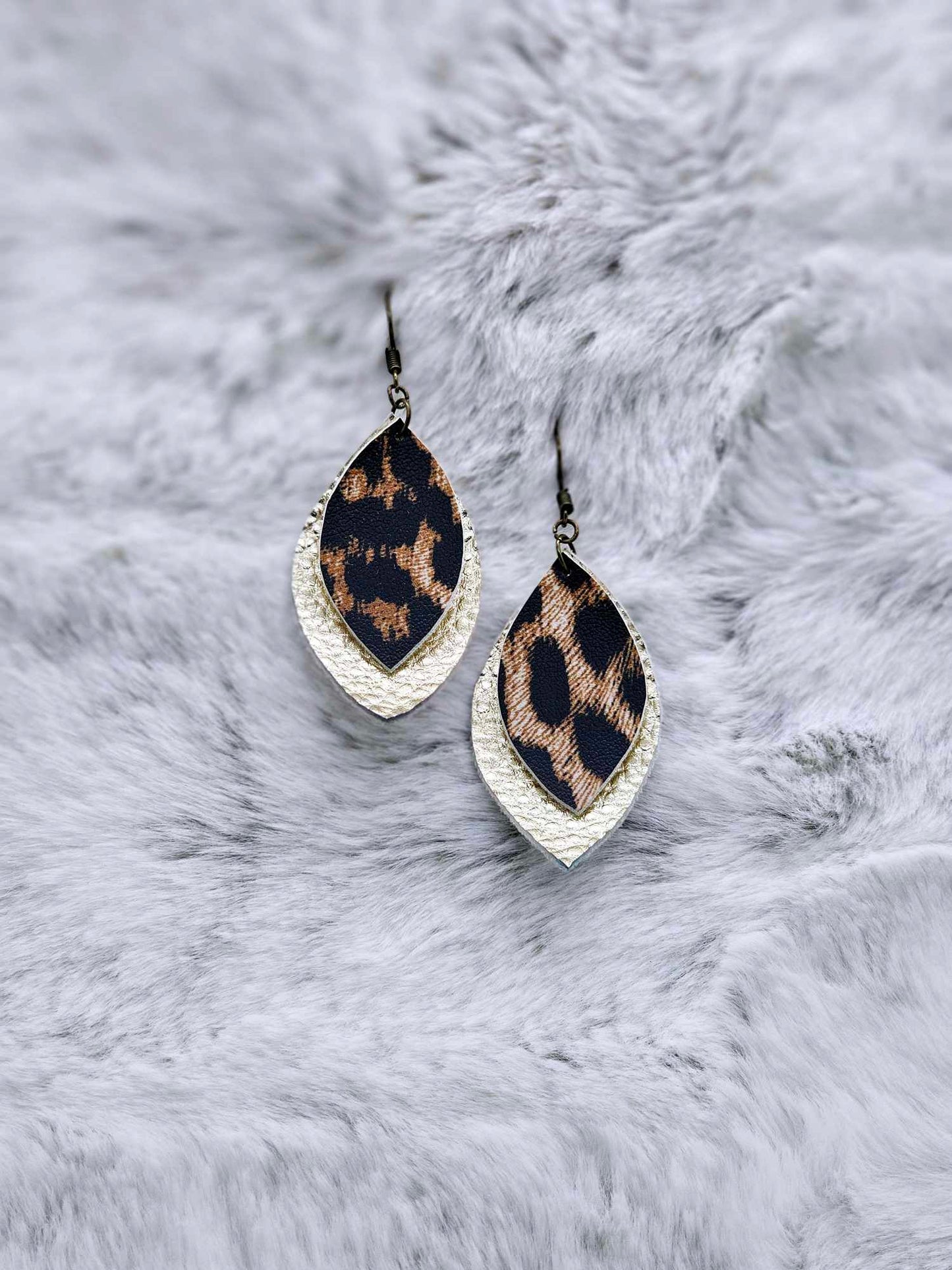 DOUBLE LAYERED FAUX LEATHER EARRINGS