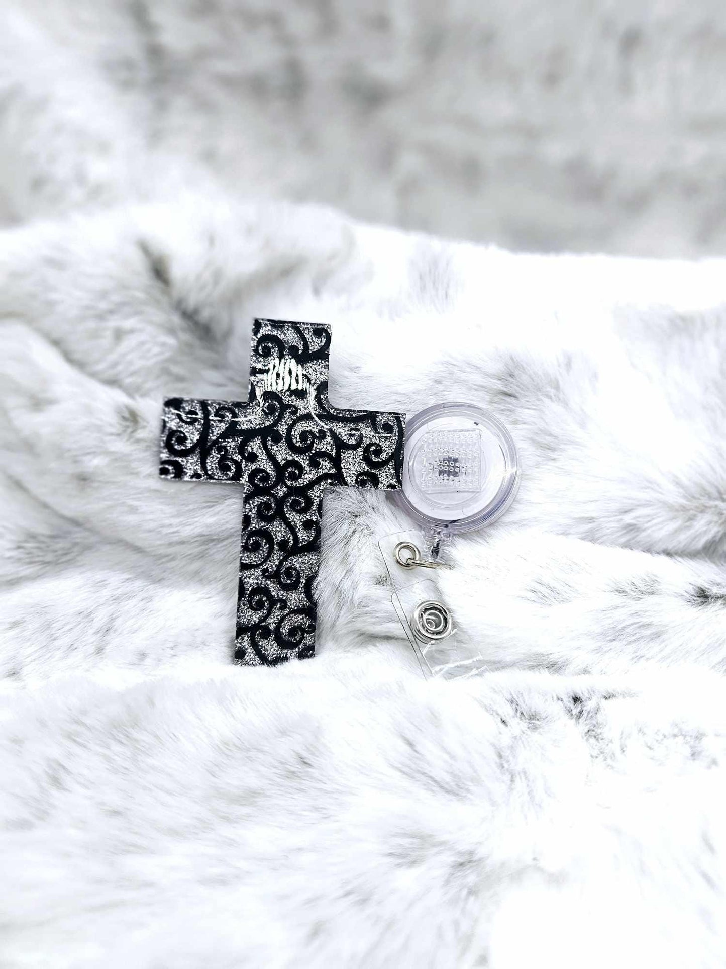 CROSS BADGE REEL