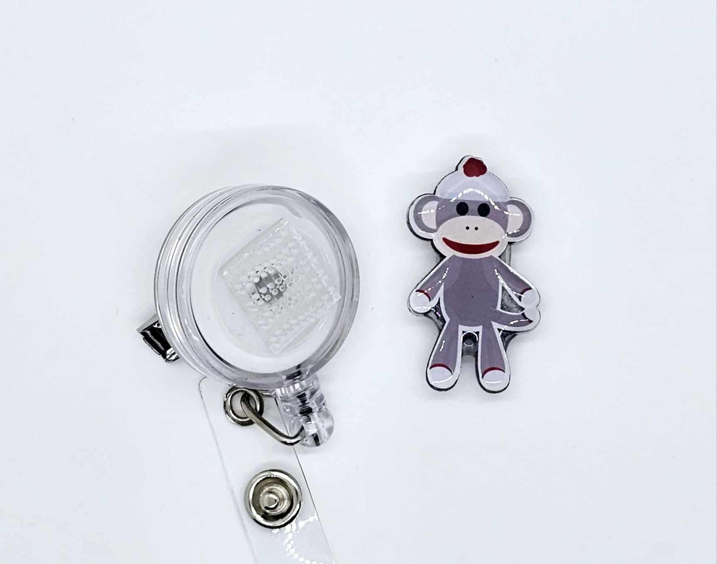 SOCK MONKEY BADGE REEL