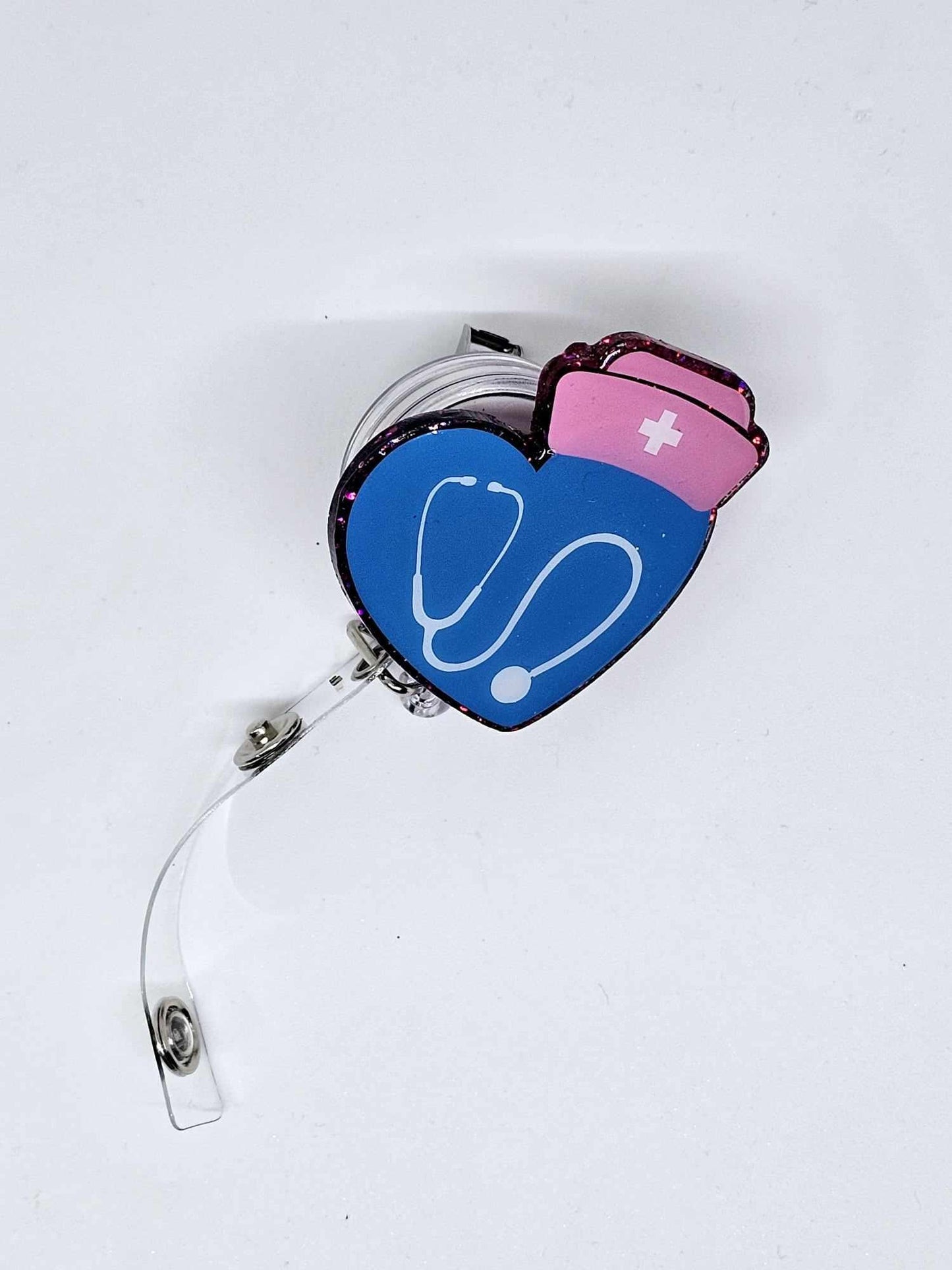 HEART, STETHOSCOPE AND NURSES CAP BADGE REEL