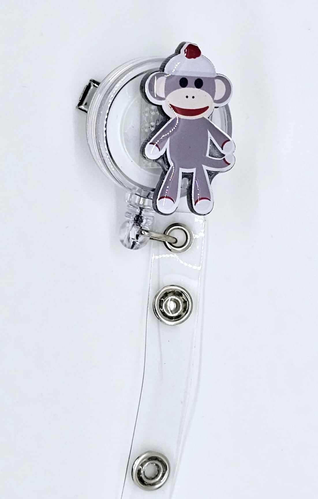 SOCK MONKEY BADGE REEL