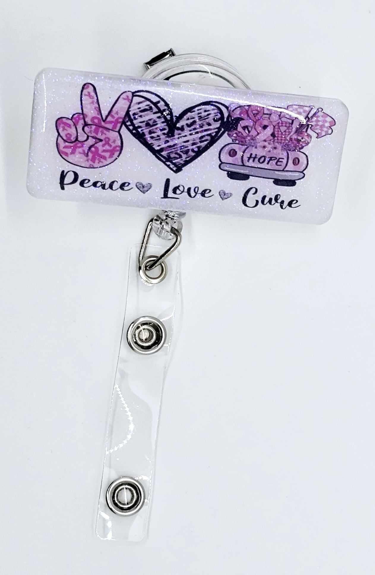 PEACE LOVE CURE BADGE REEL