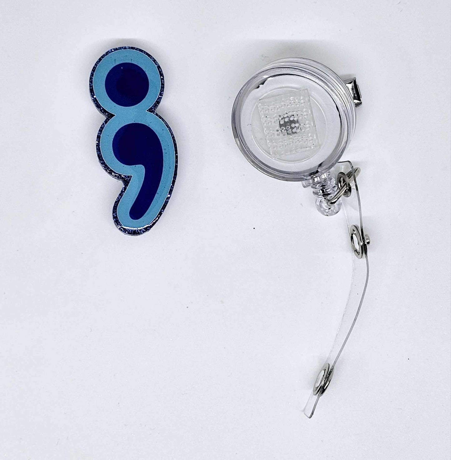 SEMICOLON BADGE REEL