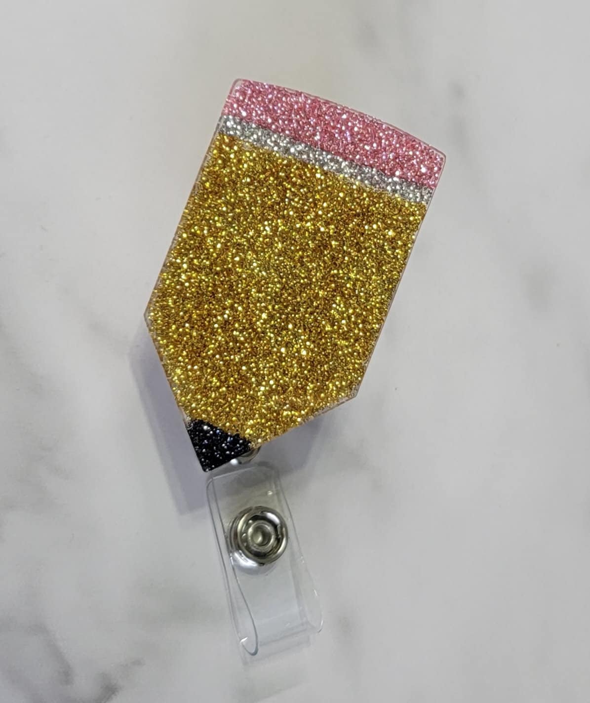 GLITTER PENCIL BADGE REEL