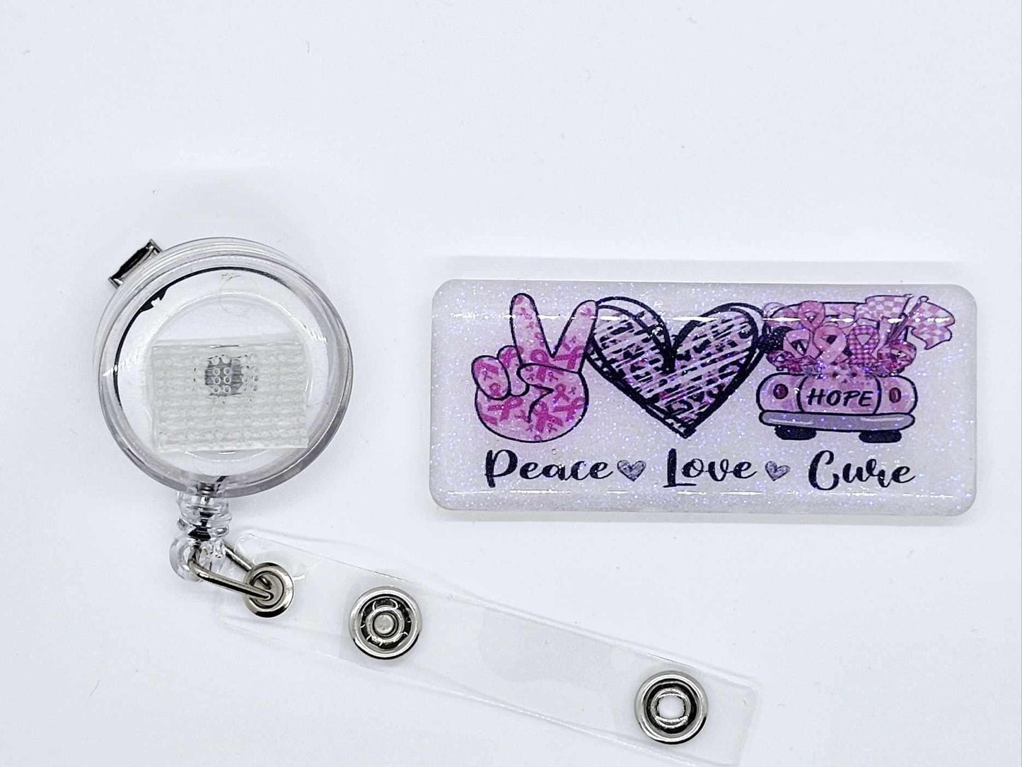 PEACE LOVE CURE BADGE REEL