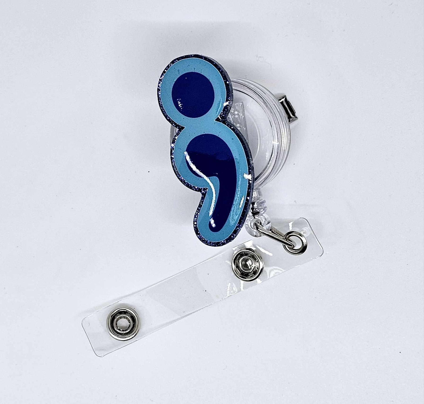 SEMICOLON BADGE REEL