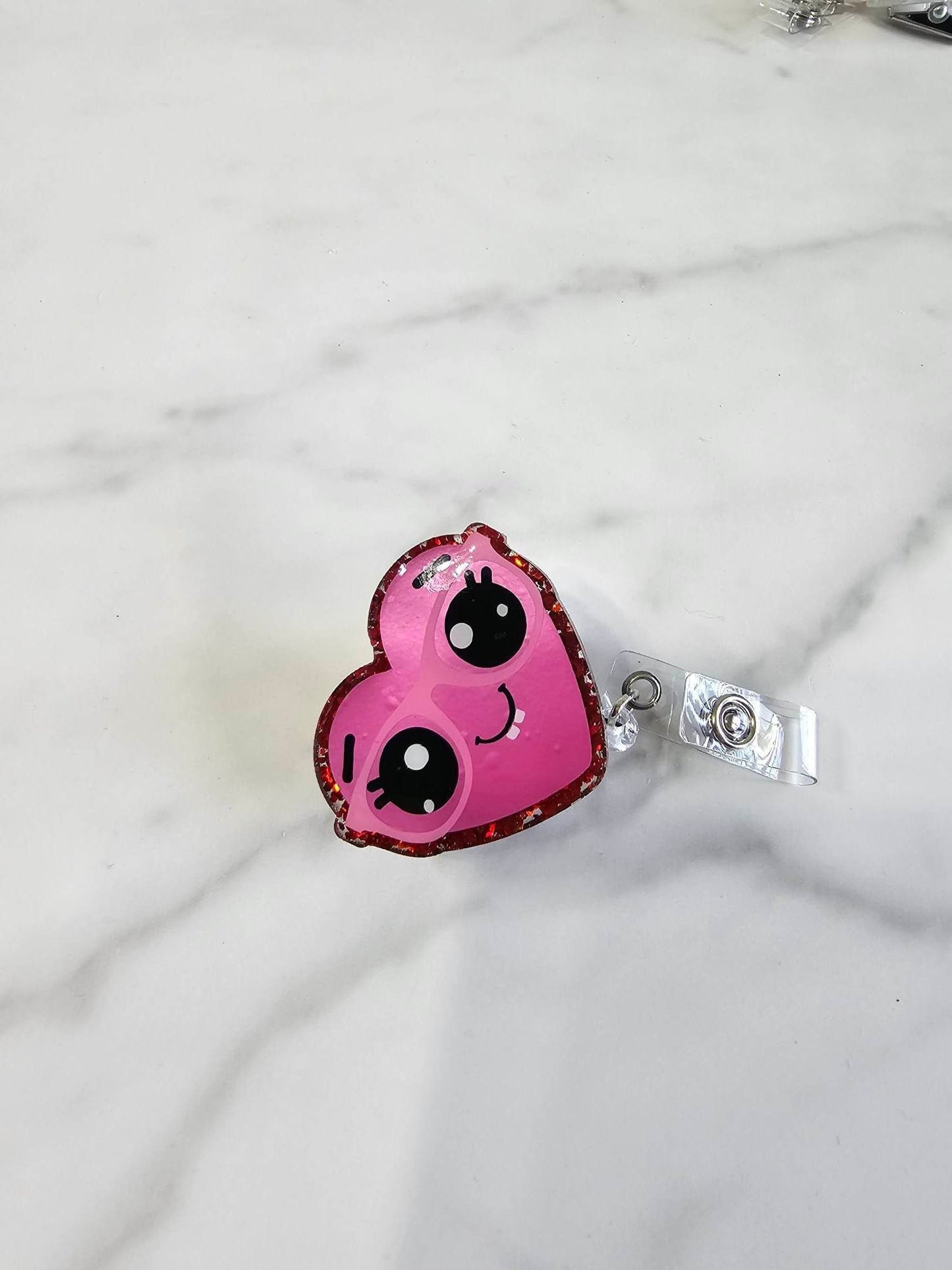 HEART WITH GLASSES BADGE REEL