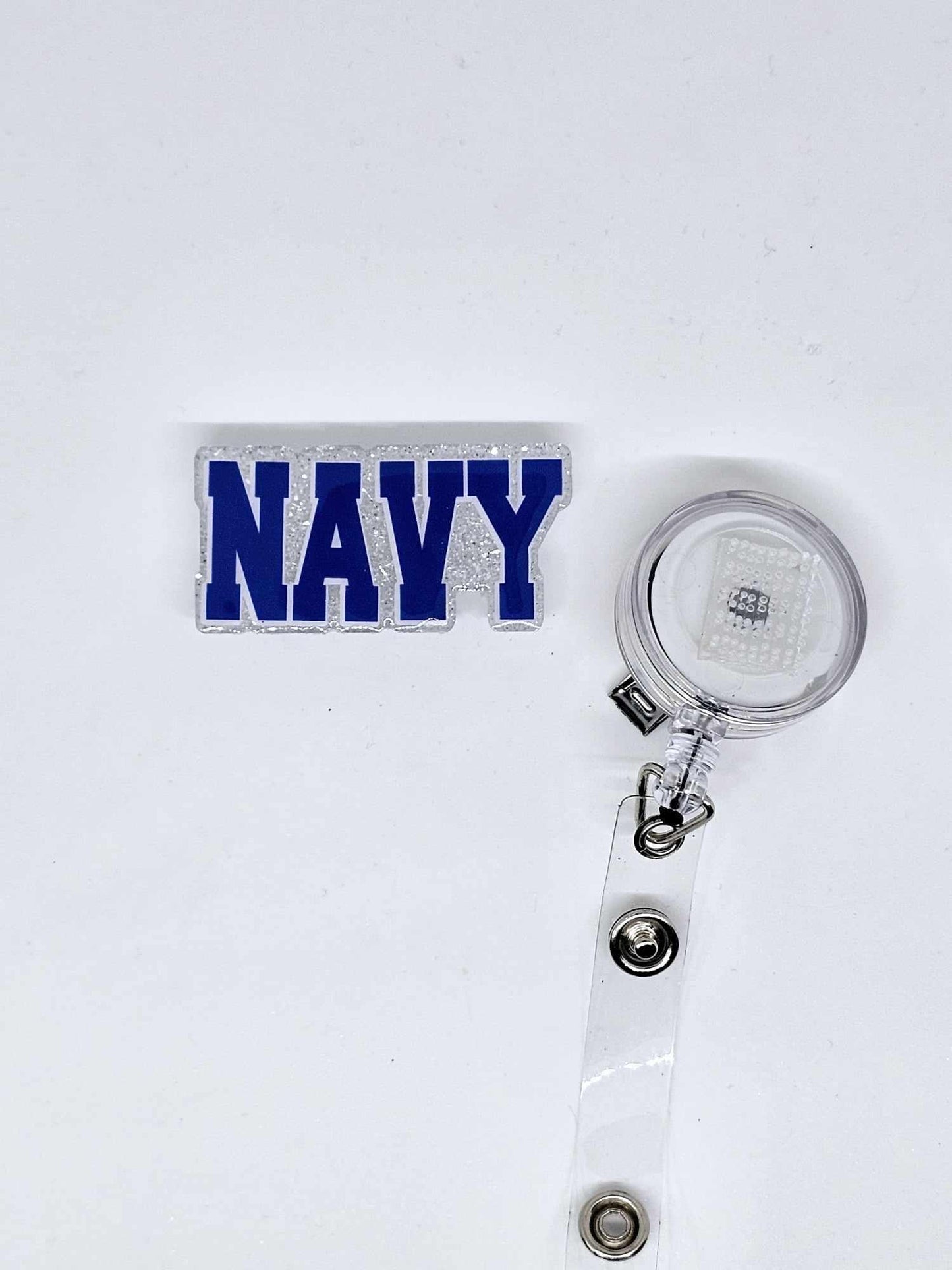 NAVY BADGE REEL