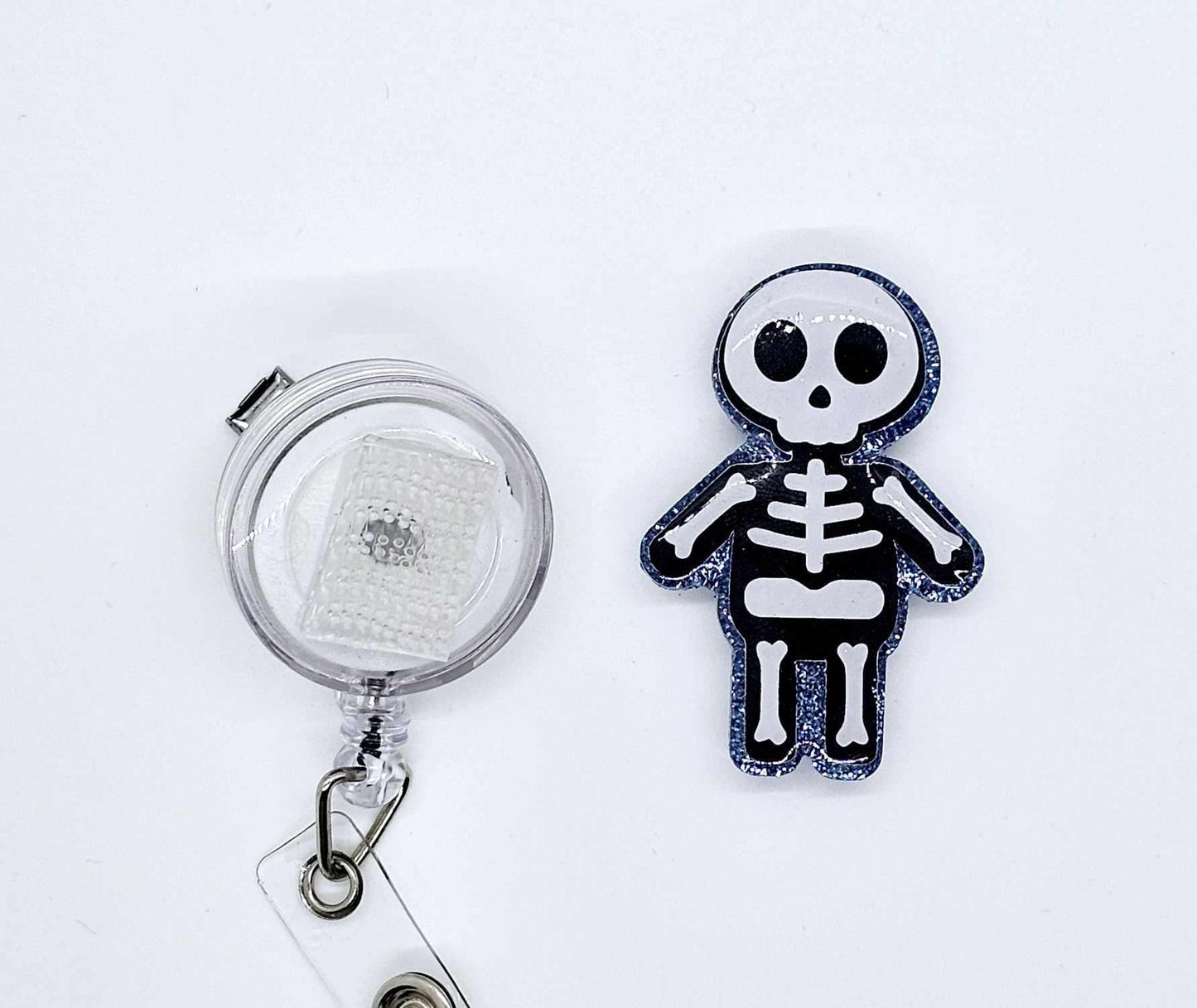 BOY SKELETON BADGE REEL