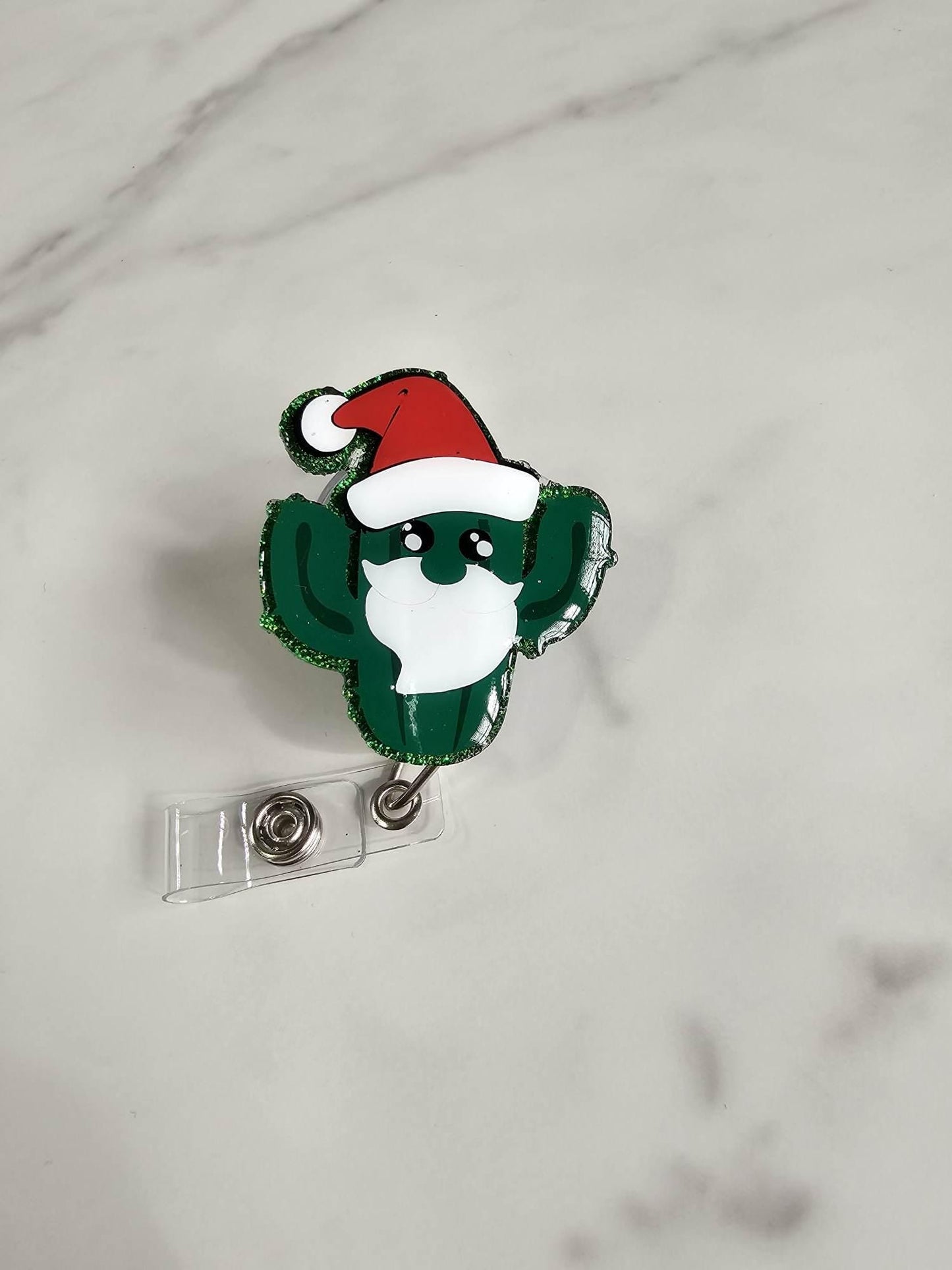 CACTUS SANTA BADGE REEL
