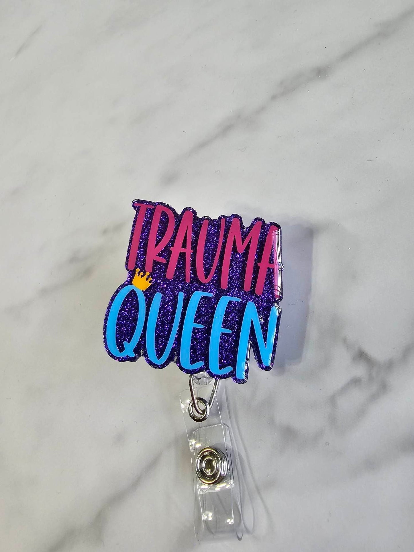 TRAUMA QUEEN BADGE REEL