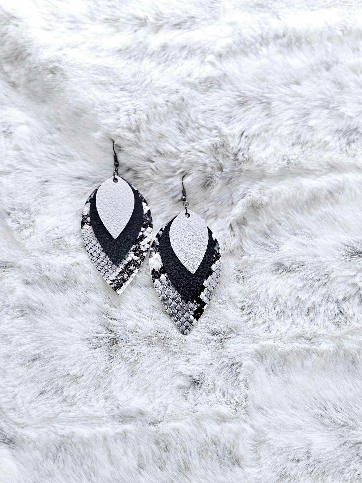 TRIPLE LAYERED FAUX LEATHER EARRINGS