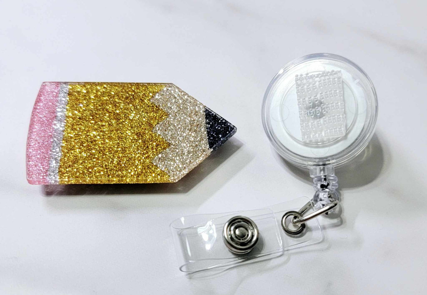 PENCIL BADGE REEL