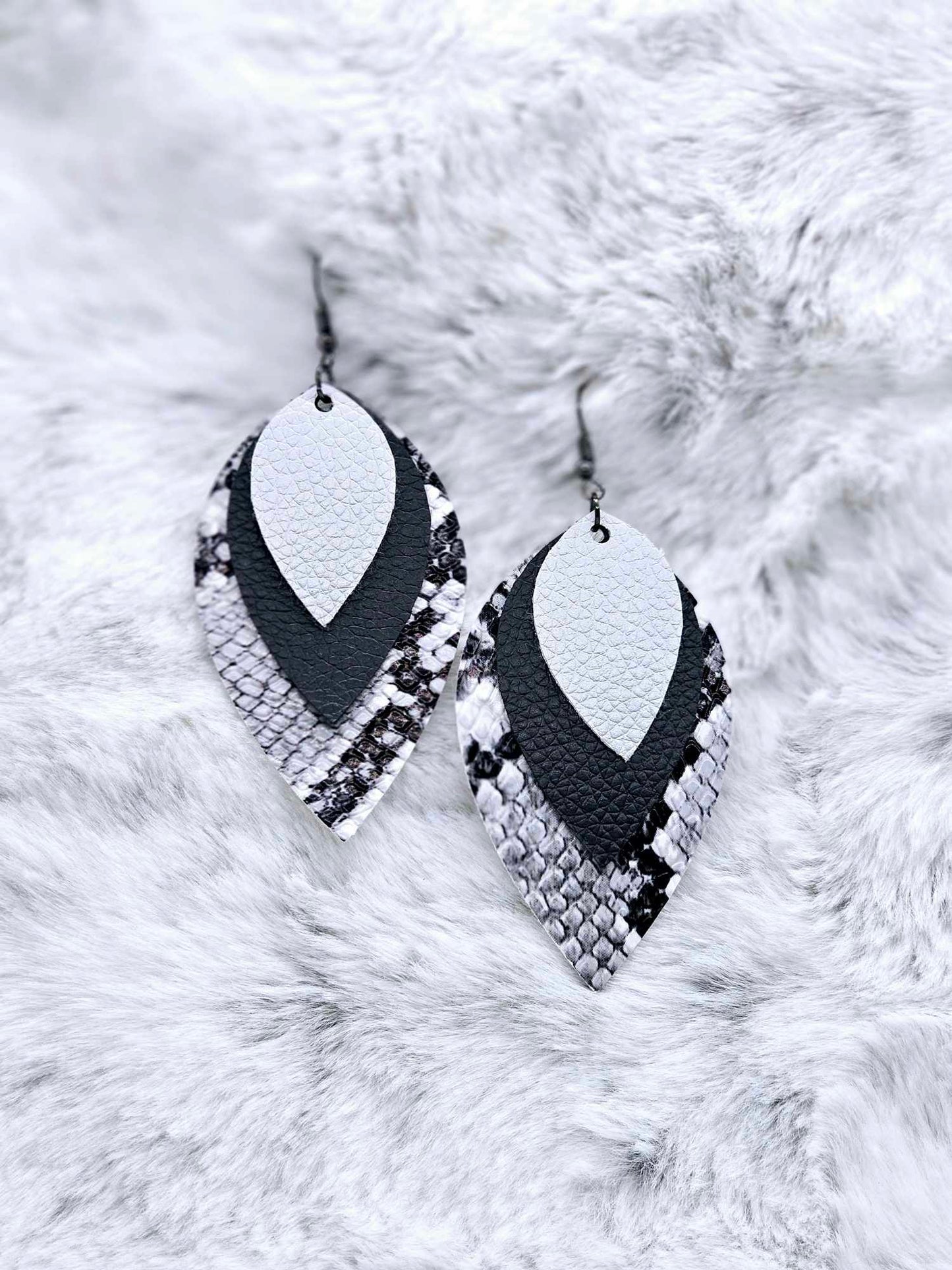 TRIPLE LAYERED FAUX LEATHER EARRINGS