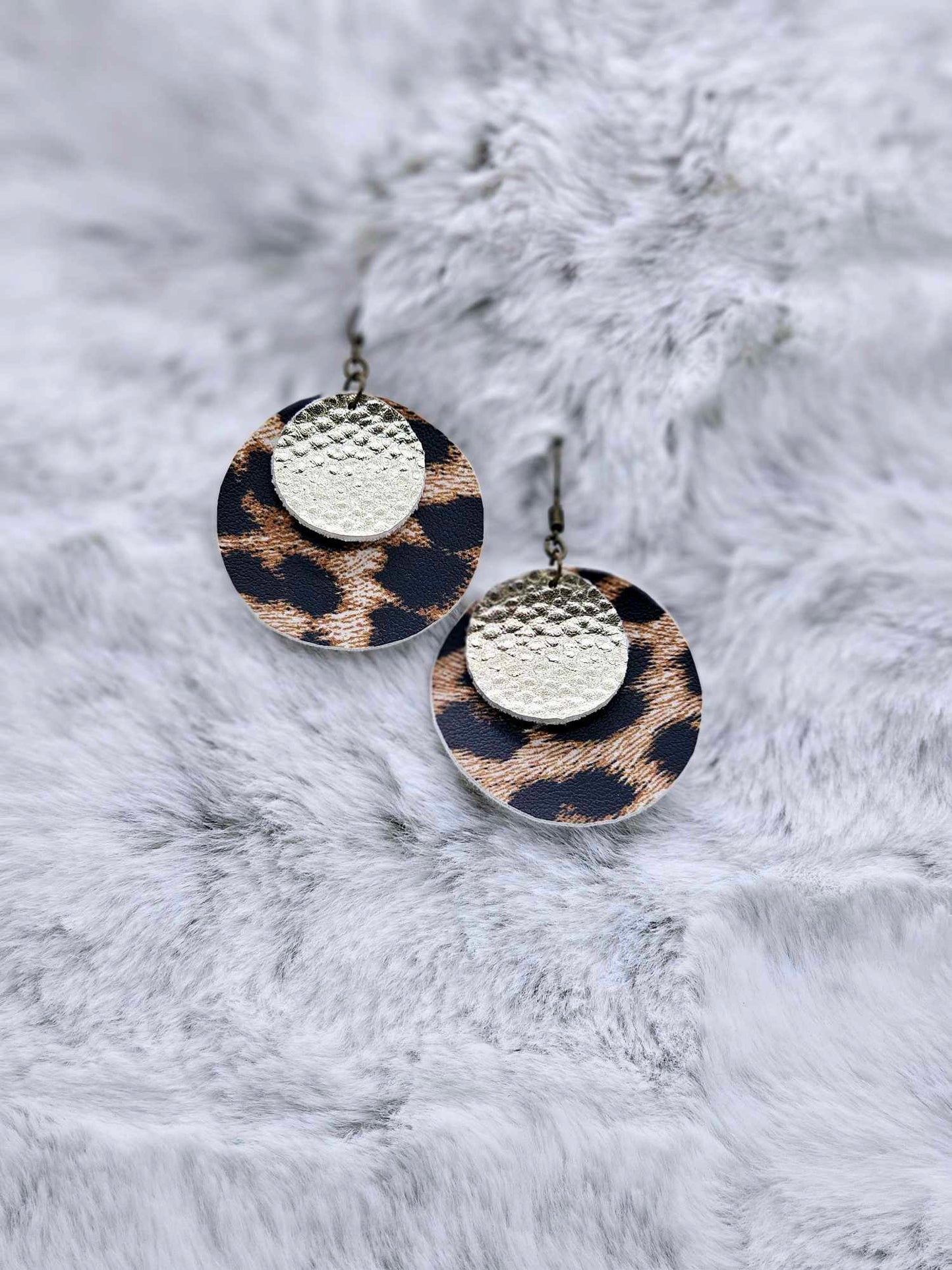ROUND FAUX LEATHER EARRINGS