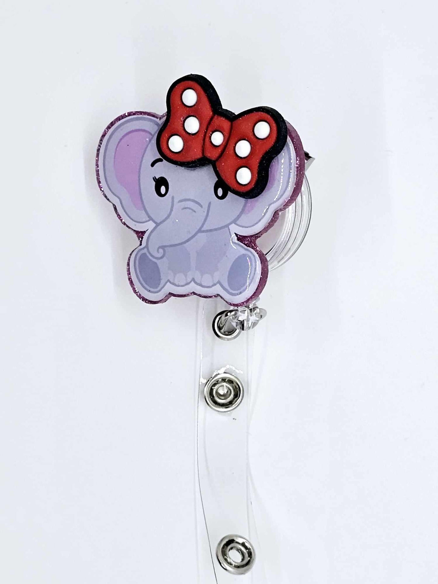 ELEPHANT WITH 3D BOW BADGE REEL