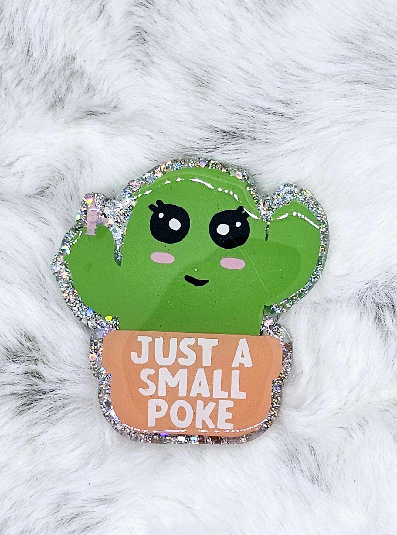 JUST A SMALL POKE BADGE REEL