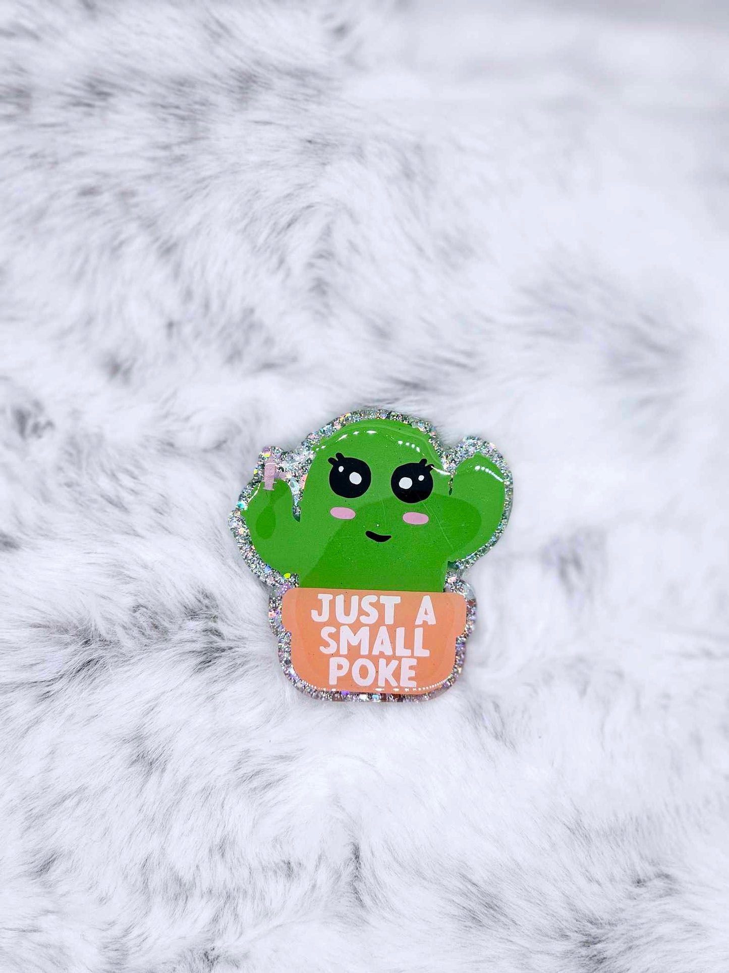 JUST A SMALL POKE BADGE REEL