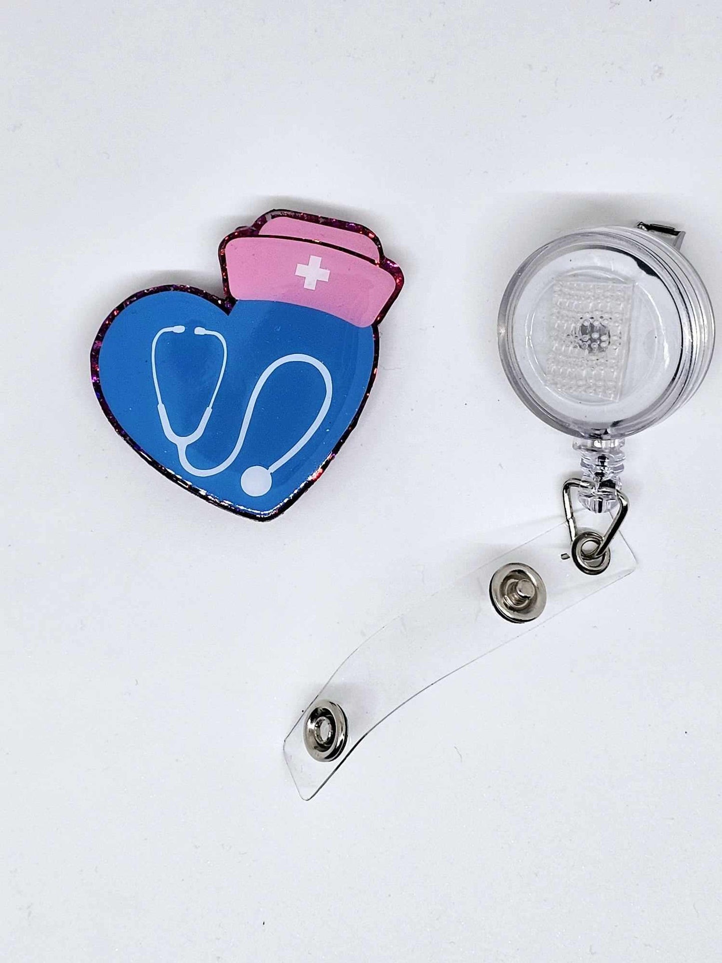 HEART, STETHOSCOPE AND NURSES CAP BADGE REEL