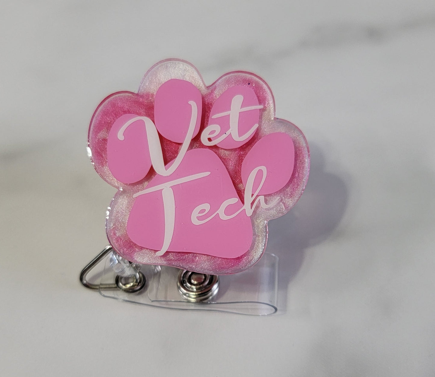 PAW PRINT BADGE REEL