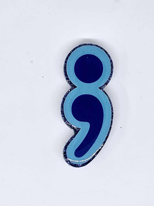SEMICOLON BADGE REEL