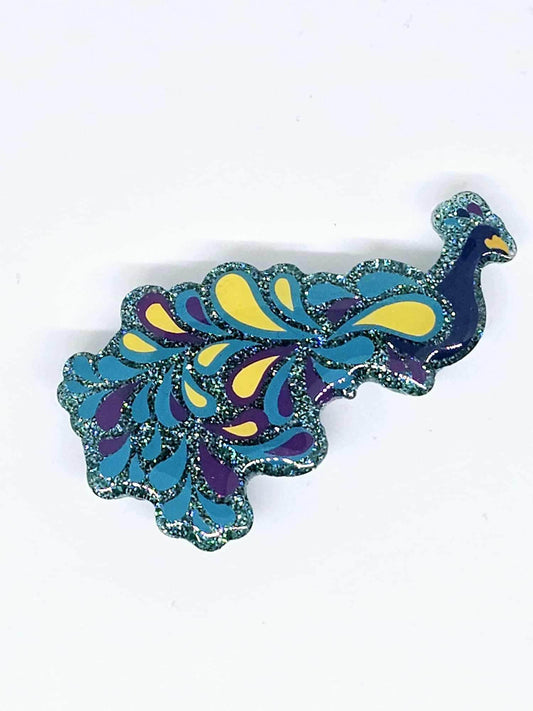 PEACOCK BADGE REEL