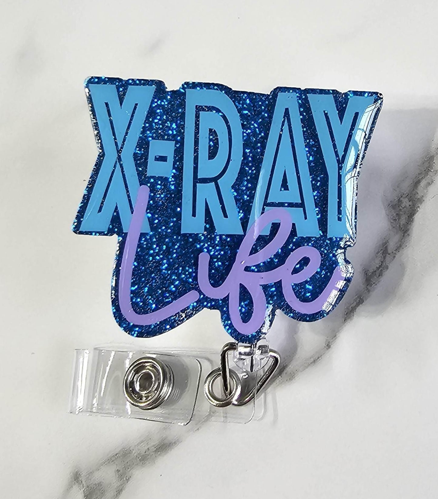 X-RAY LIFE BADGE REEL