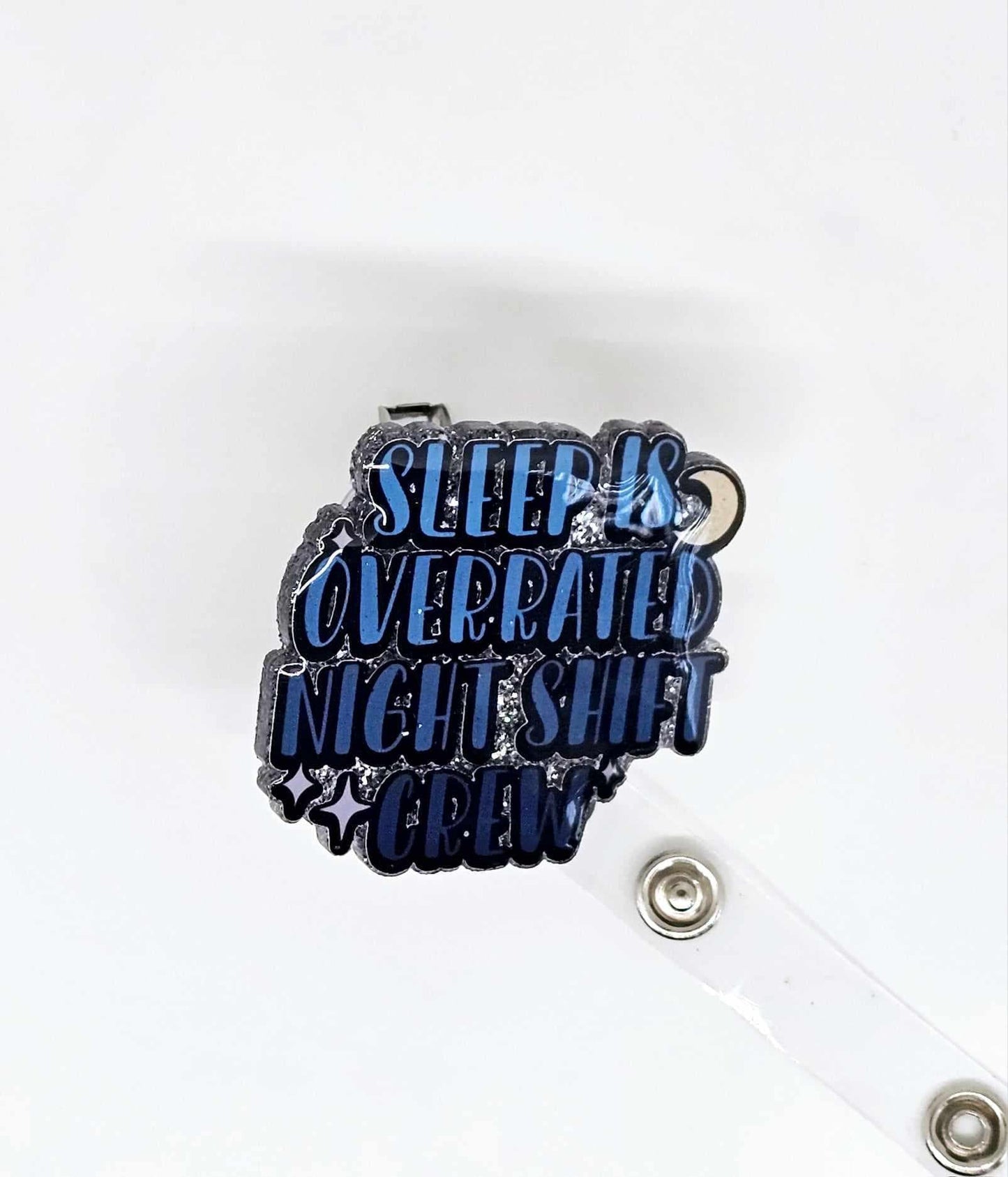 SLEEP IS OVERRATED NIGHT SHIFT CREW BADGE REEL