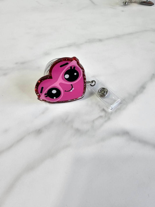 HEART WITH GLASSES BADGE REEL