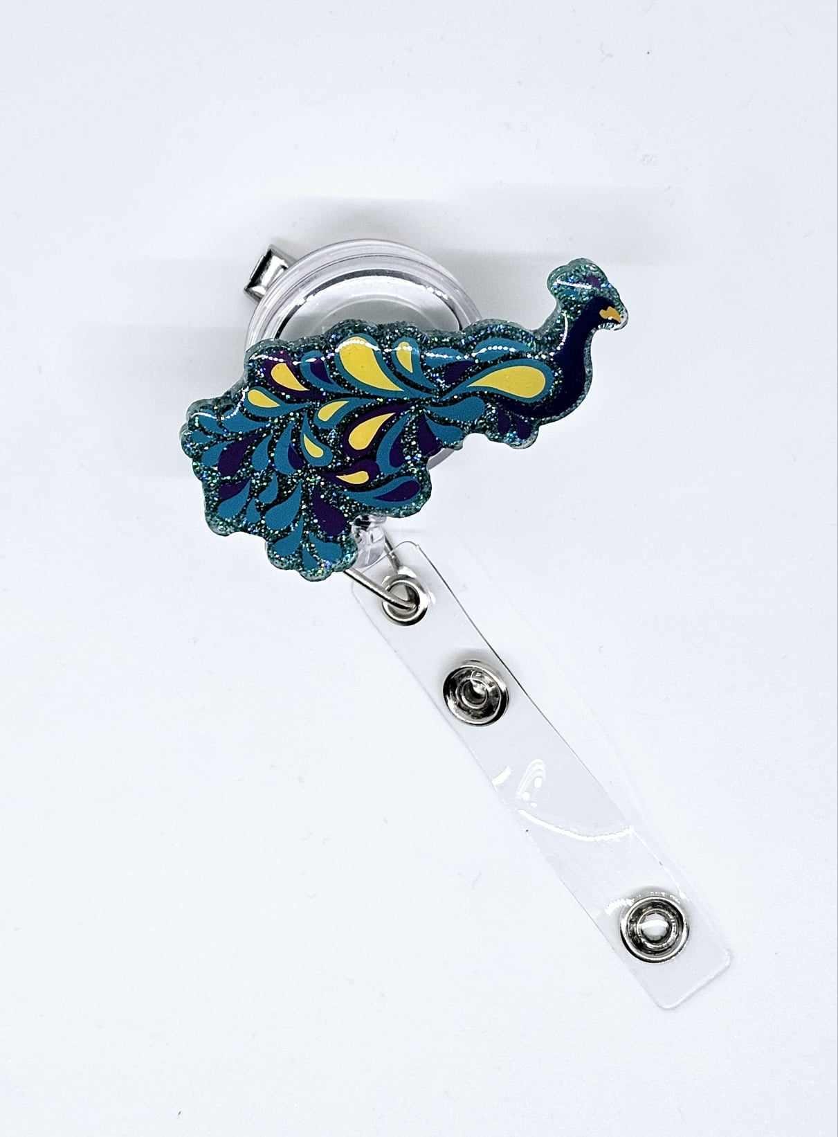 PEACOCK BADGE REEL