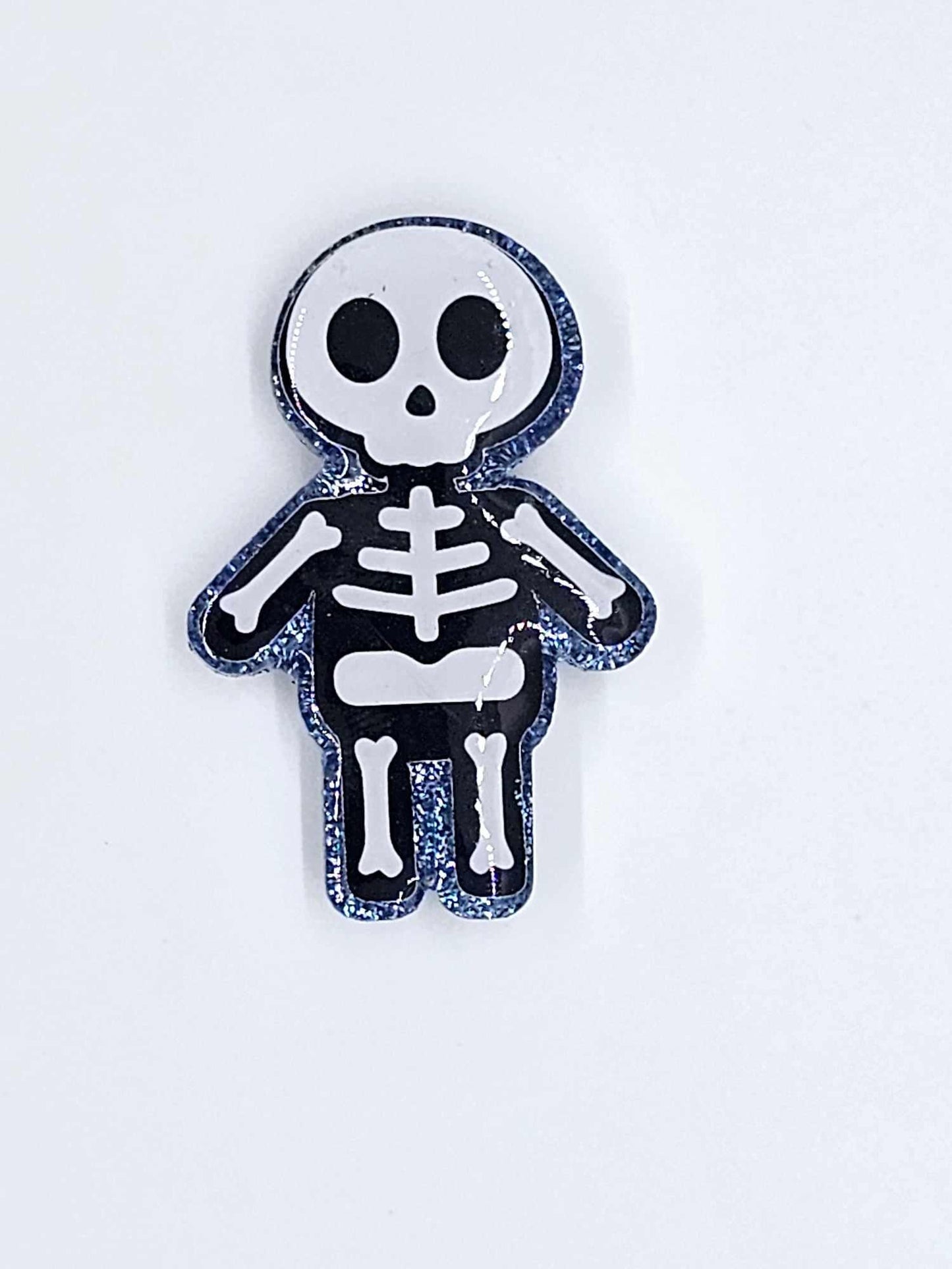 BOY SKELETON BADGE REEL