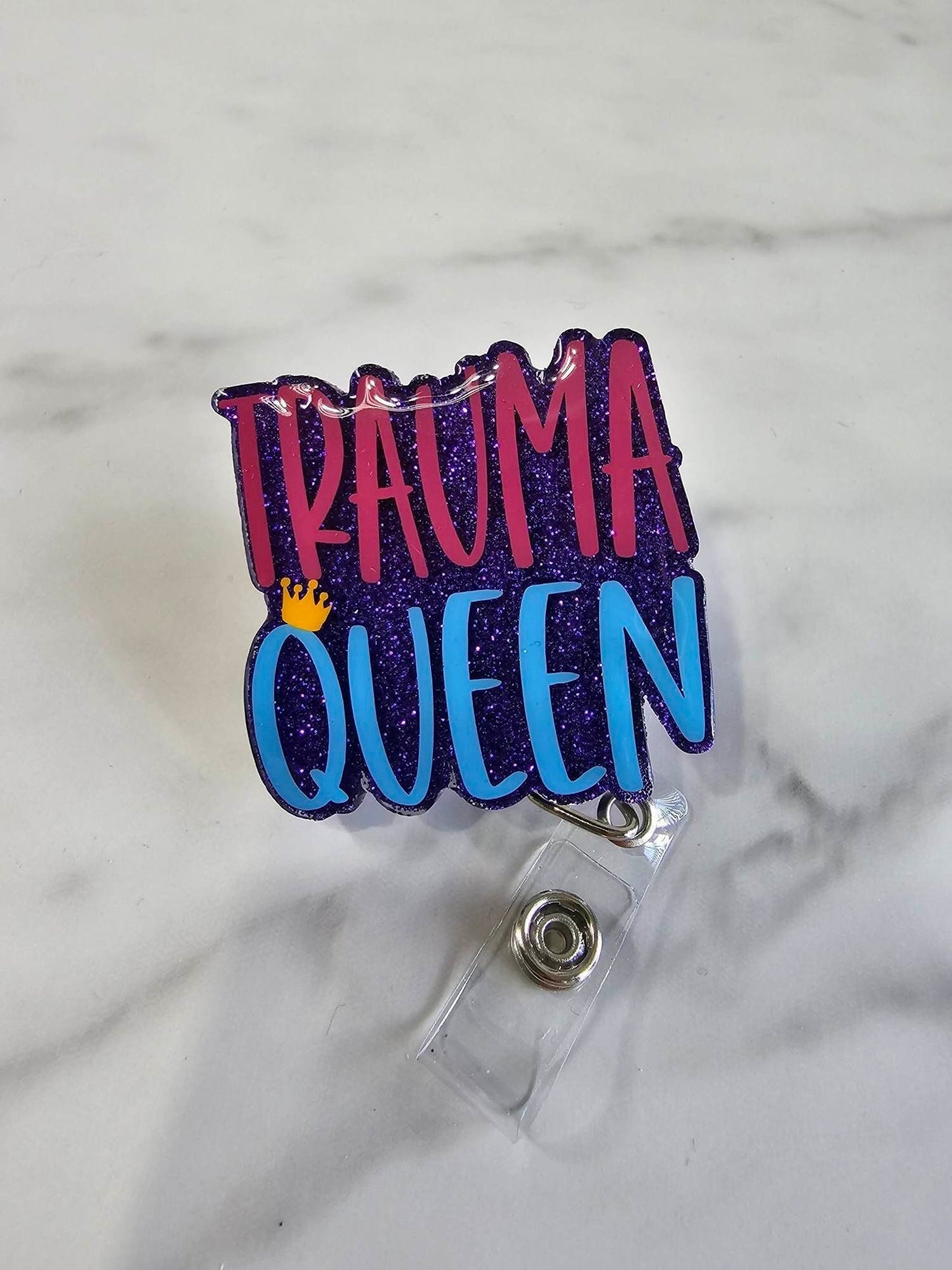TRAUMA QUEEN BADGE REEL