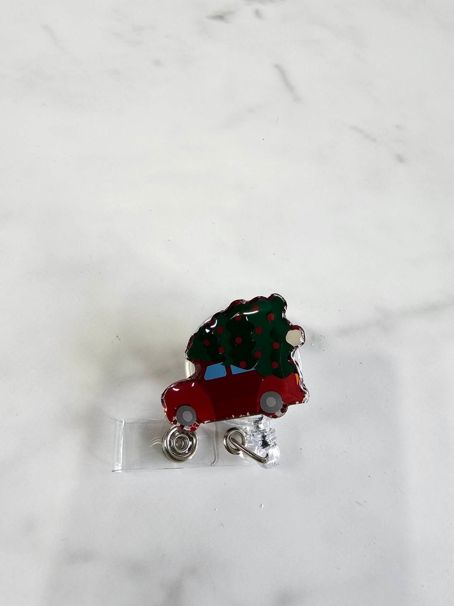 RED CAR WITH CHRISTMAS TREE BADGE REEL