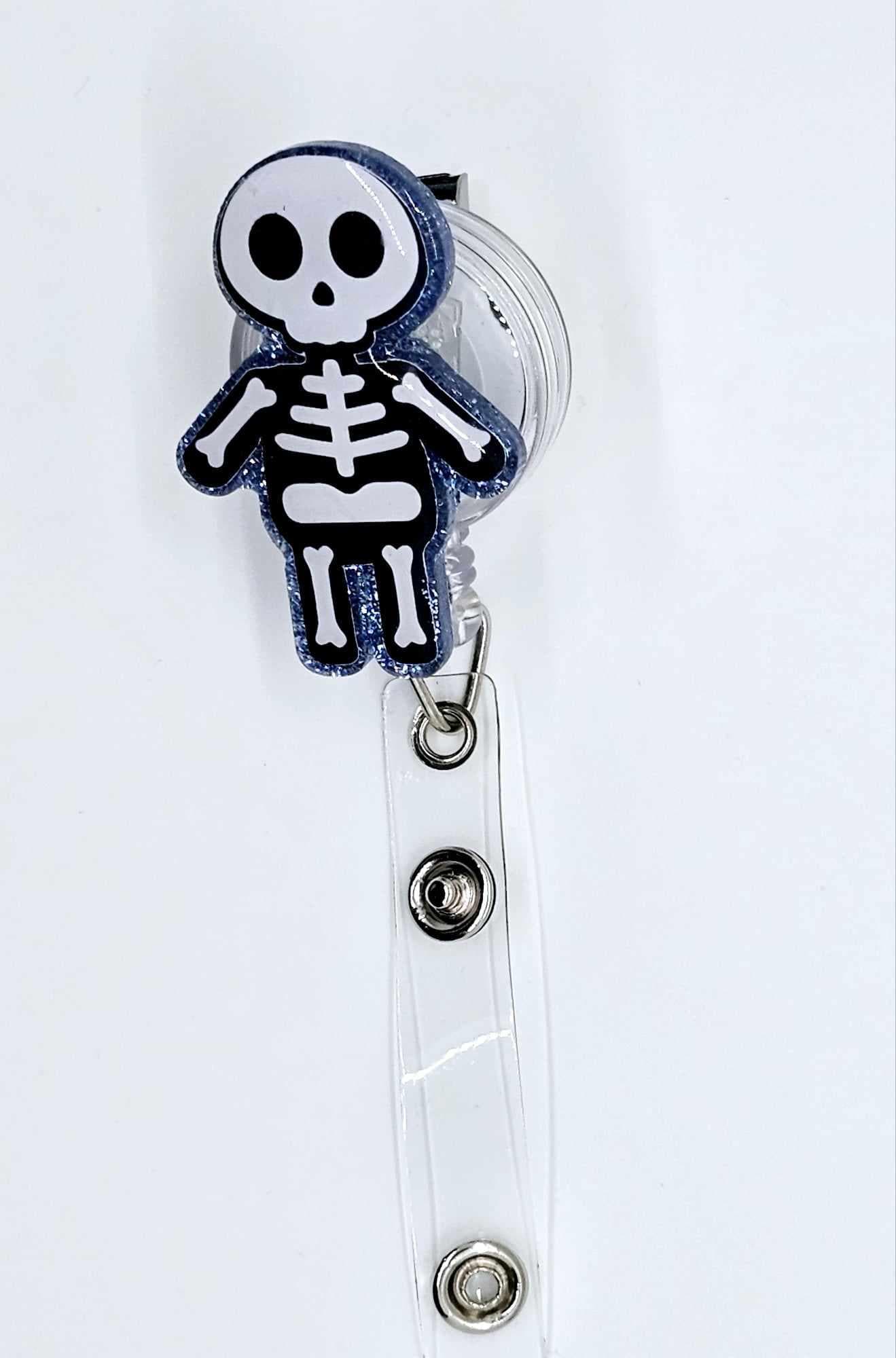 BOY SKELETON BADGE REEL