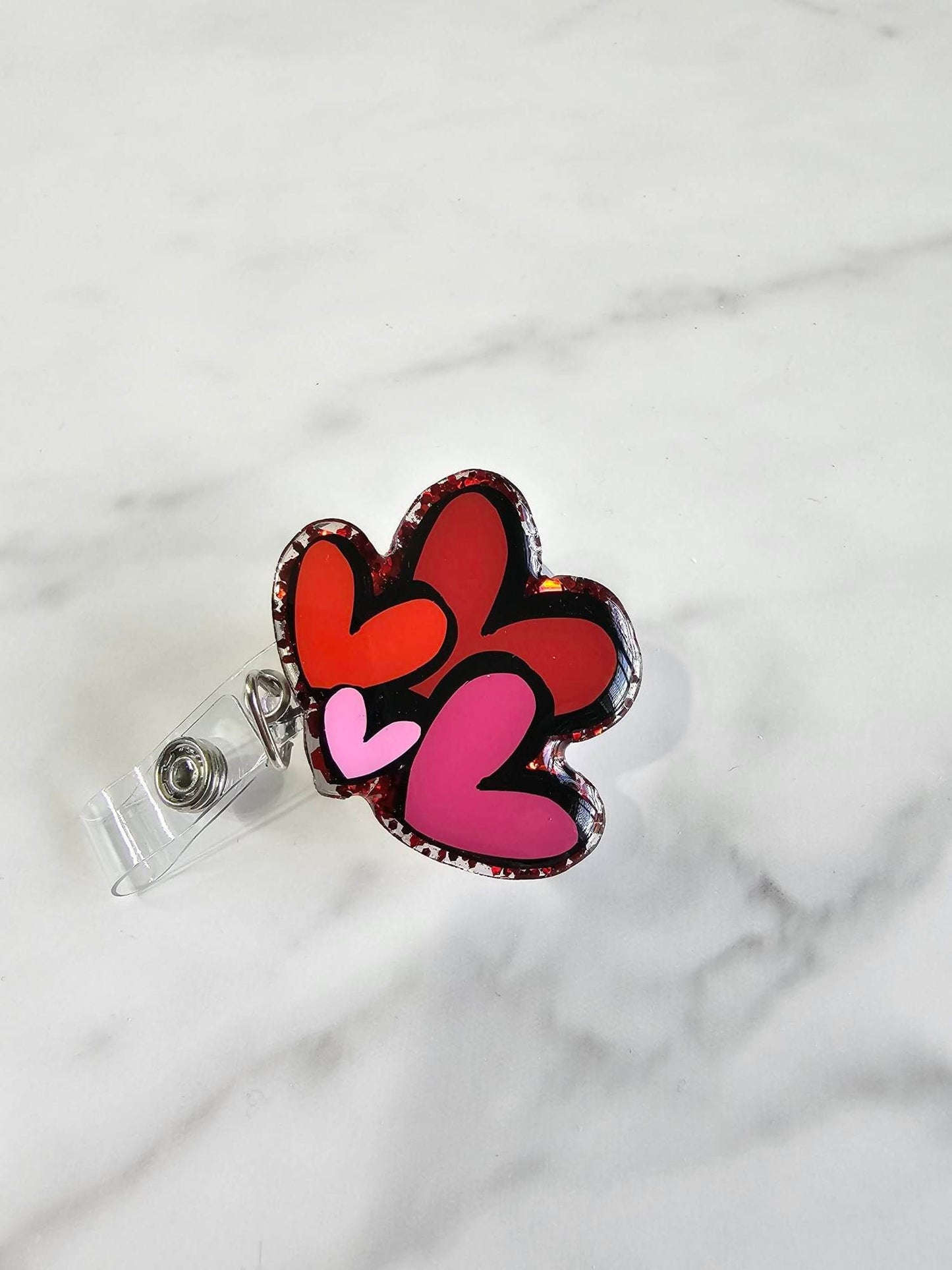 HEARTS BADGE REEL